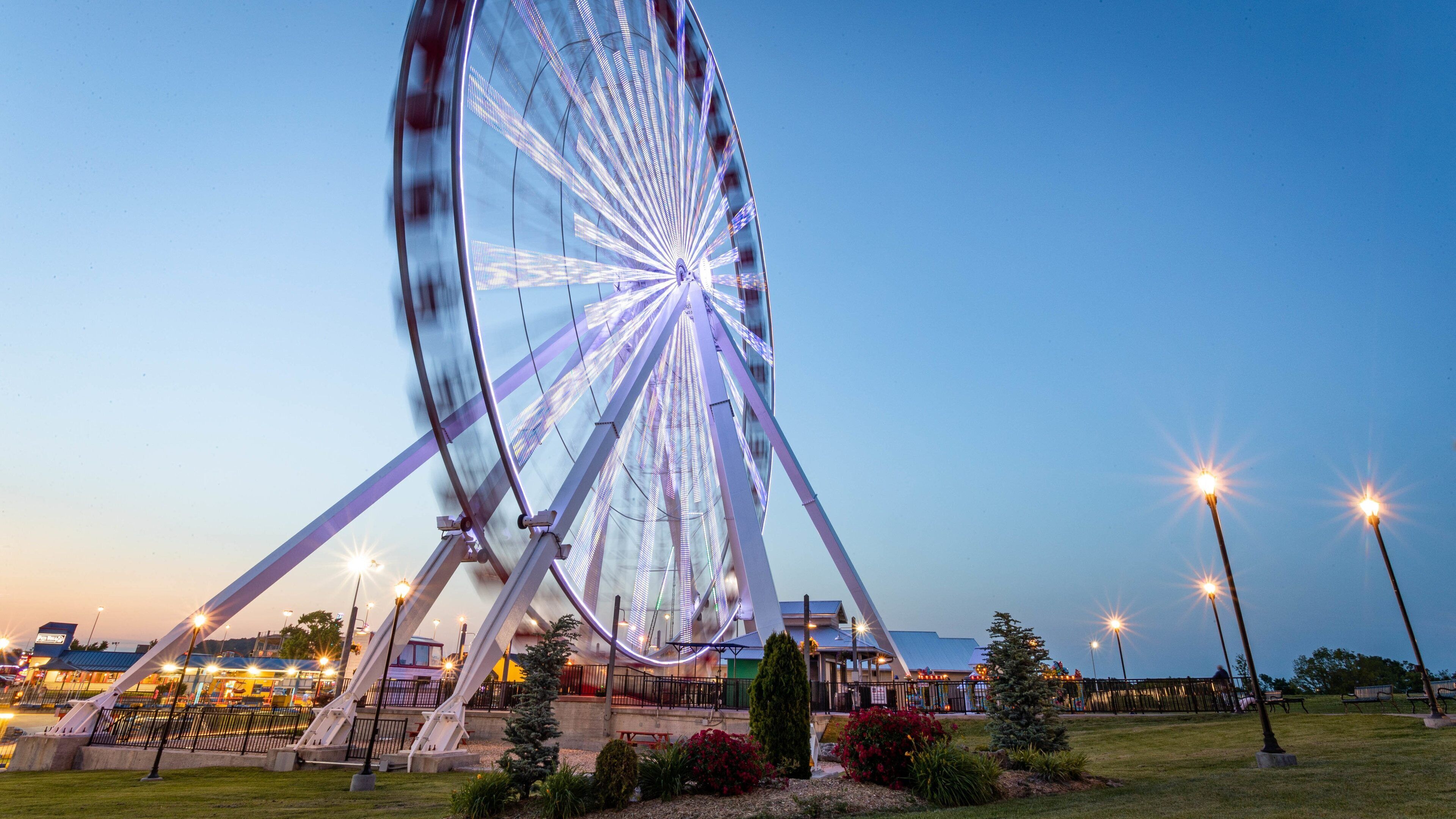 Branson Ferris Wheel featuring a sunset