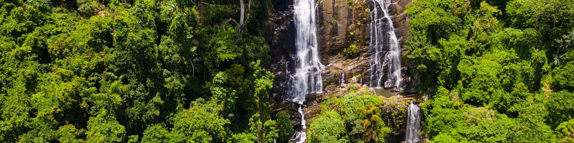 Waterfall in the green forest. Hunas Falls in the jungle. Hunnasgiriya, Sri Lanka.