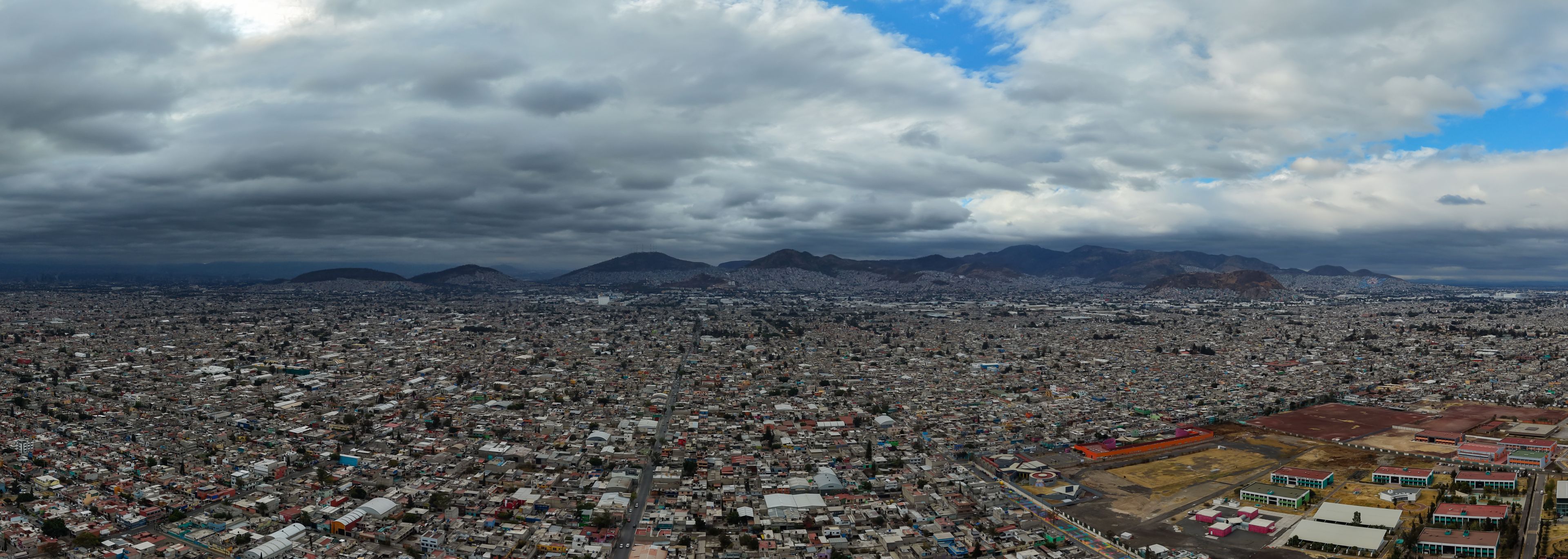 Sweeping drone panorama over Ecatepec metropolitan area