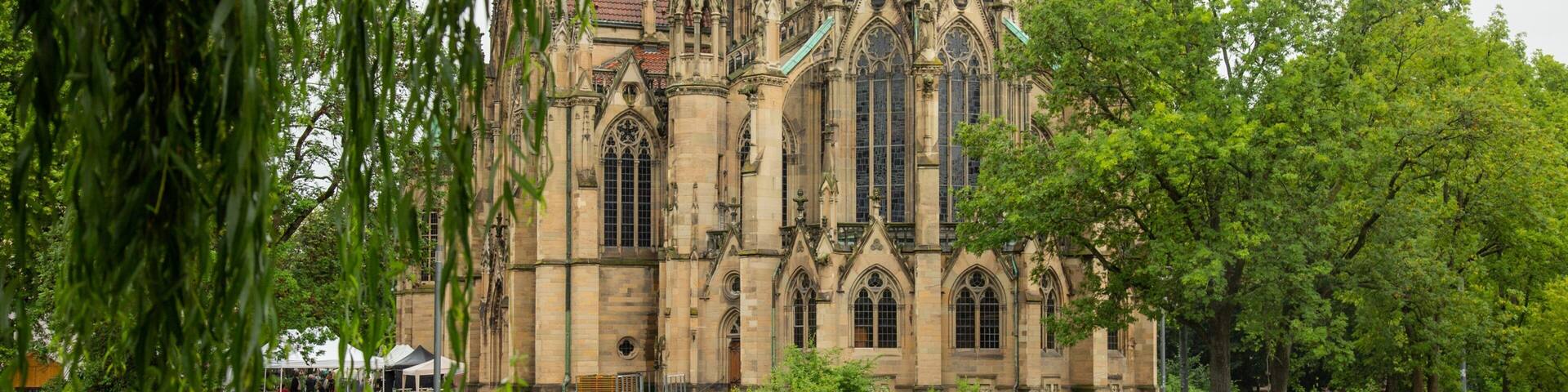 Stuttgart-West which includes a pond, a church or cathedral and bird life