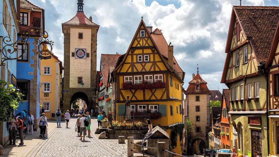 This city is so colorful and so picturesque it is hard to believe it is real. It almost looks like something you would see at Disney World!! But it is for real and it's a hot destination in Germany. If you are considering traveling to Germany and are curious as to how to fit this into your itinerary, read our post:
http://www.earthtrekkers.com/bavaria-itinerary/