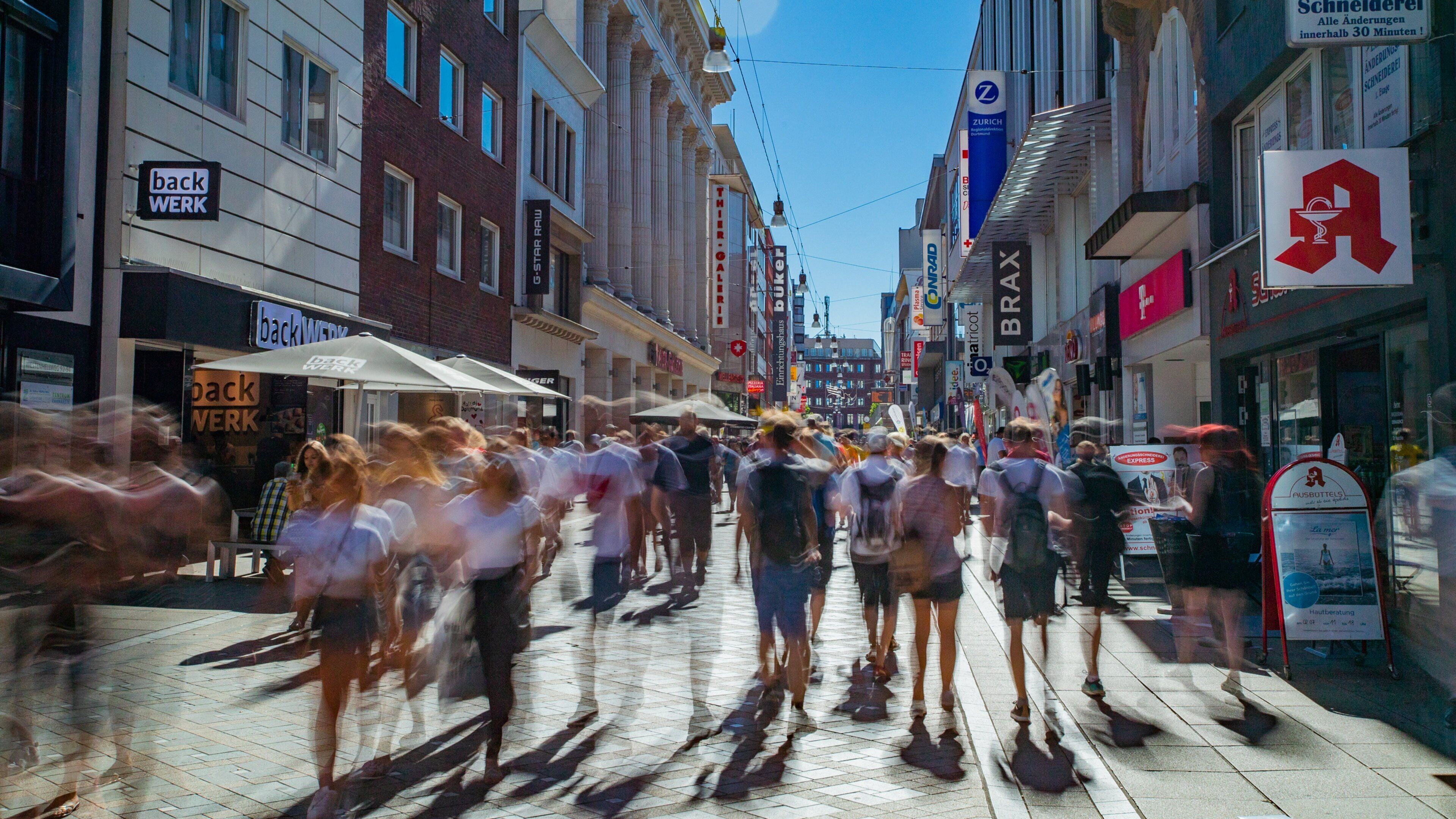 Dortmund City Centre which includes a city and street scenes as well as a small group of people