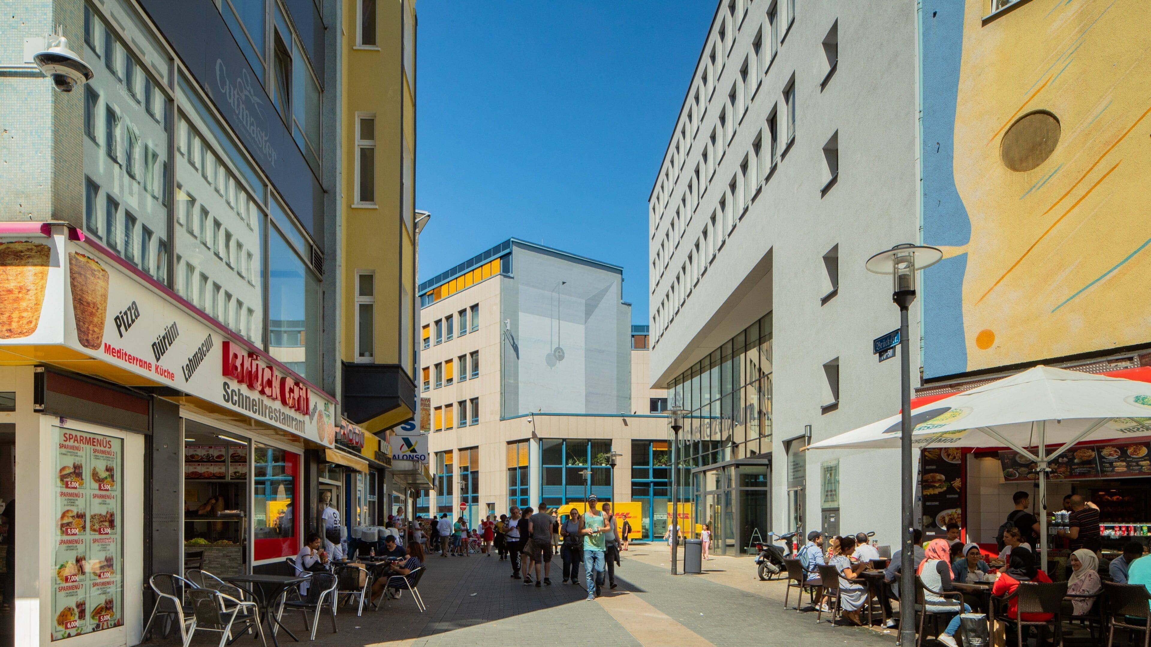 Dortmund City Centre which includes street scenes and a city as well as a small group of people