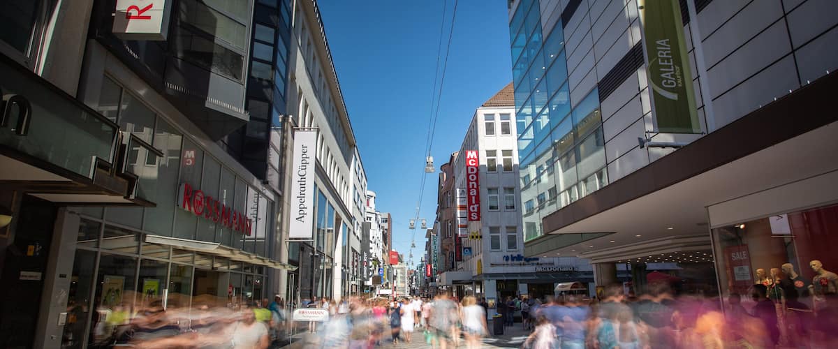 Dortmund City Centre which includes a city and street scenes as well as a small group of people