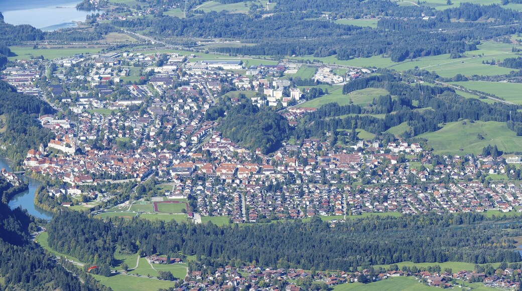 Panorama of Tegelberg, 1881m, on Füssen with historic old town, the Lech and behind it the Weissensee, on the right the Hopfensee and the Forggensee, Ostallgäu, Allgäu, Bavaria, Germany