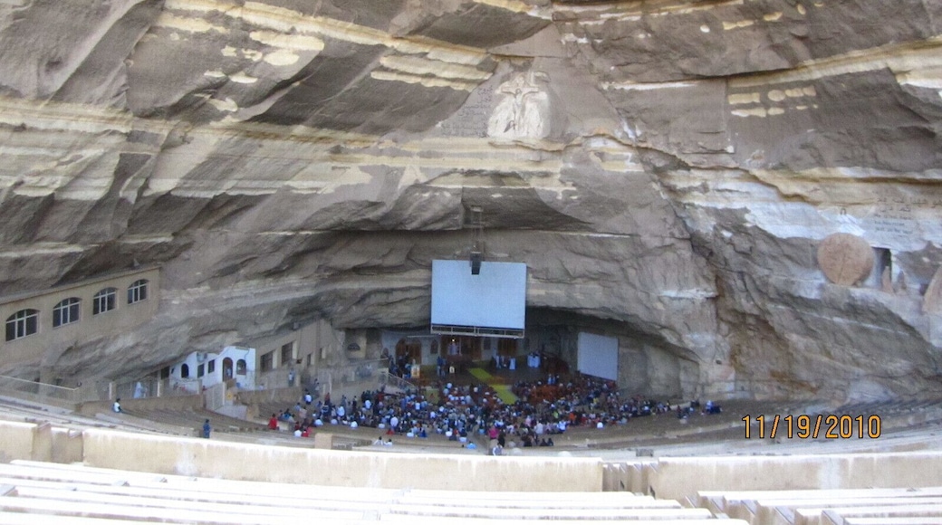 This is a hidden gem. It is in Garbage City so most tour guides will not take you. But if you go through the garbage city and up a hill you will find this Christian church carved into a cave. The walls have elaborate carvings in them and the amphitheater is huge. I think this was one of the neatest things we saw on this trip. Be respectful when going through trash city, they are not used to tourists and don't want their photos taken. Do not go after dark.
http://www.amusingplanet.com/2013/09/the-cave-church-of-zabbaleen-in-cairo.html