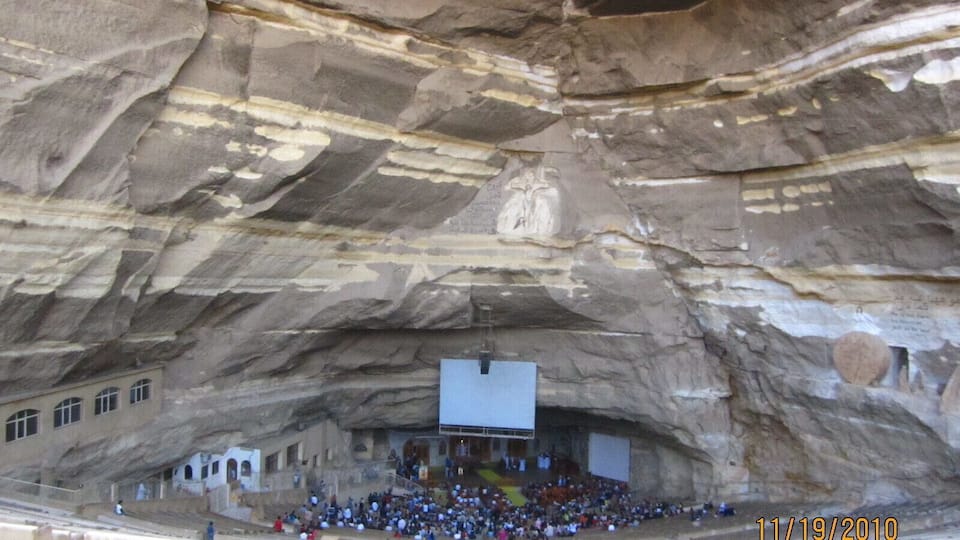This is a hidden gem. It is in Garbage City so most tour guides will not take you. But if you go through the garbage city and up a hill you will find this Christian church carved into a cave. The walls have elaborate carvings in them and the amphitheater is huge. I think this was one of the neatest things we saw on this trip. Be respectful when going through trash city, they are not used to tourists and don't want their photos taken. Do not go after dark.
http://www.amusingplanet.com/2013/09/the-cave-church-of-zabbaleen-in-cairo.html