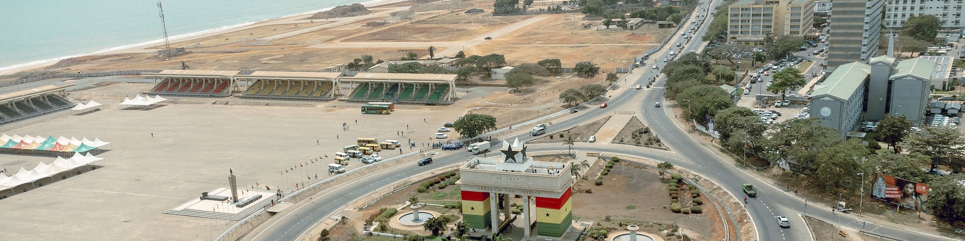 Aerial view of the iconic Independence Arch stands grandly at the center of a bustling roundabout near the Accra Sports Stadium, Osu Klottey, Greater Accra Region, Ghana.