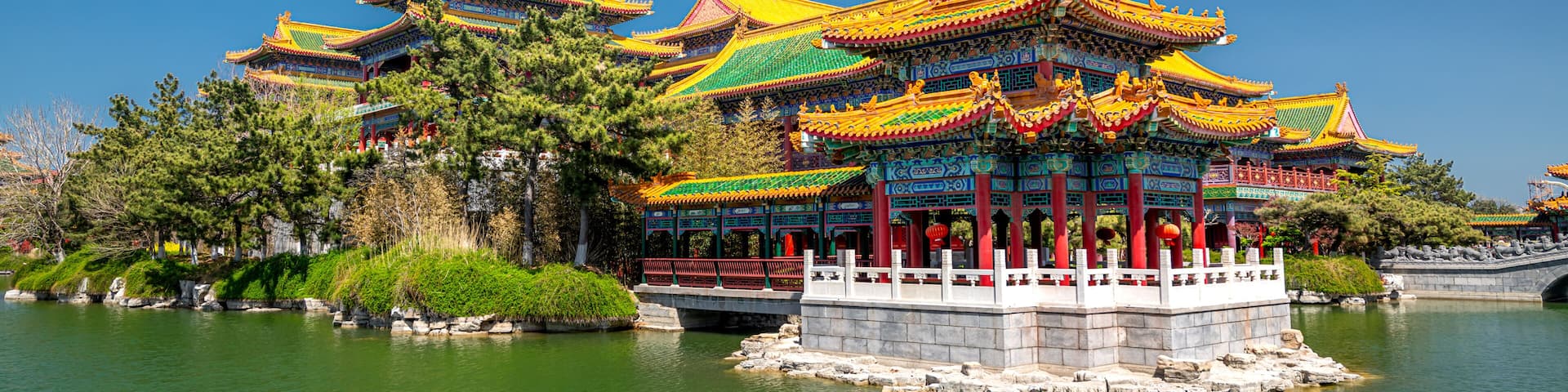 Colorful picture of green trees and Chinese pavilions in San Xian Shan tourist area, Penglai, China