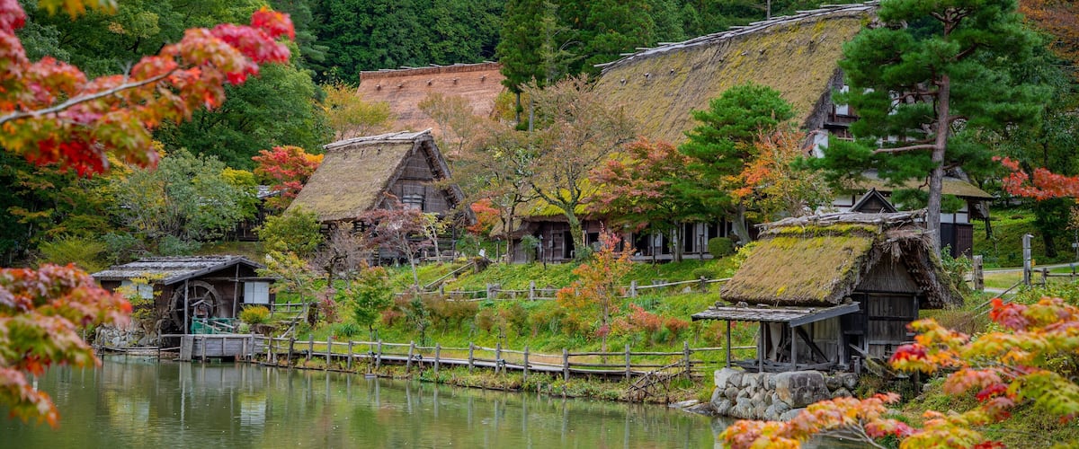 Hida Takayama Onsen which includes a small town or village and a pond