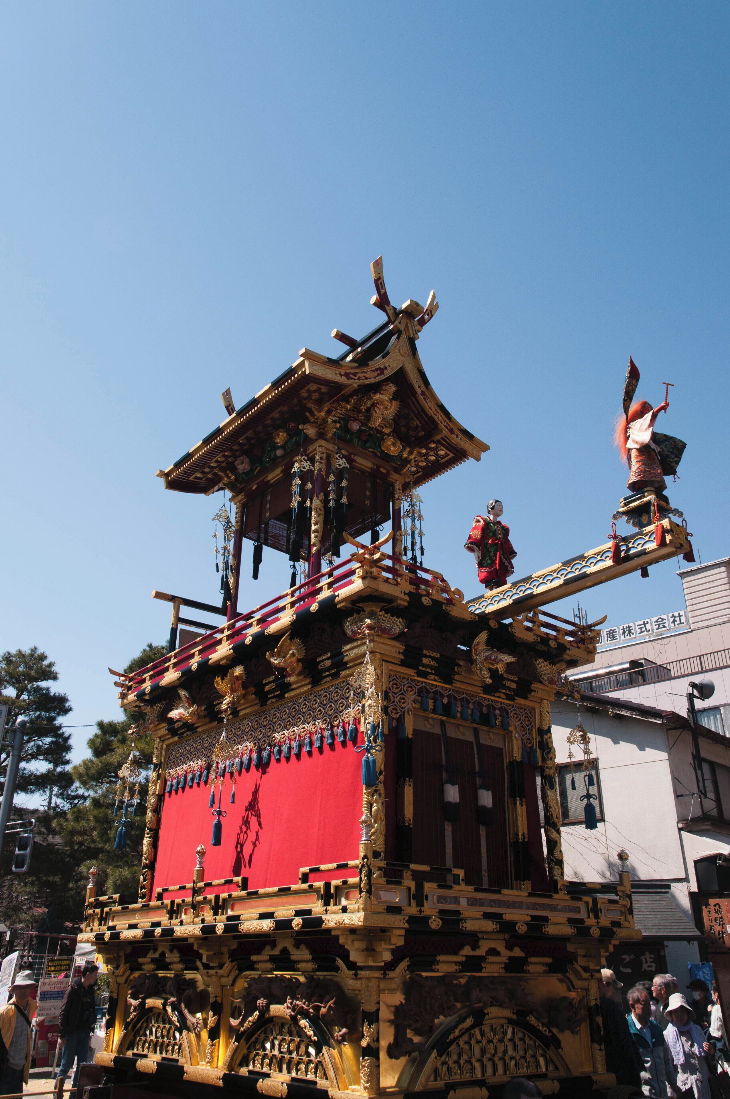 The Takayama Festival is ranked as one of Japan's three most beautiful festivals alongside Kyoto's Gion Matsuri and the Chichibu Yomatsuri. It is held twice a year in spring and autumn in the old town of Takayama. The old floats are decorated with so called karakuri ningyo, sophisticated mechanical dolls that can move and dance.

Book MONTHs in advance to get a room or take a train from another town in the area.  April is also Blossom time in Japan.