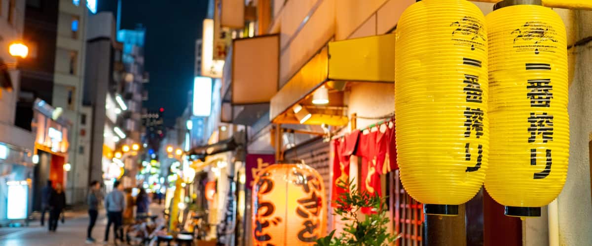 Kanda featuring signage and night scenes