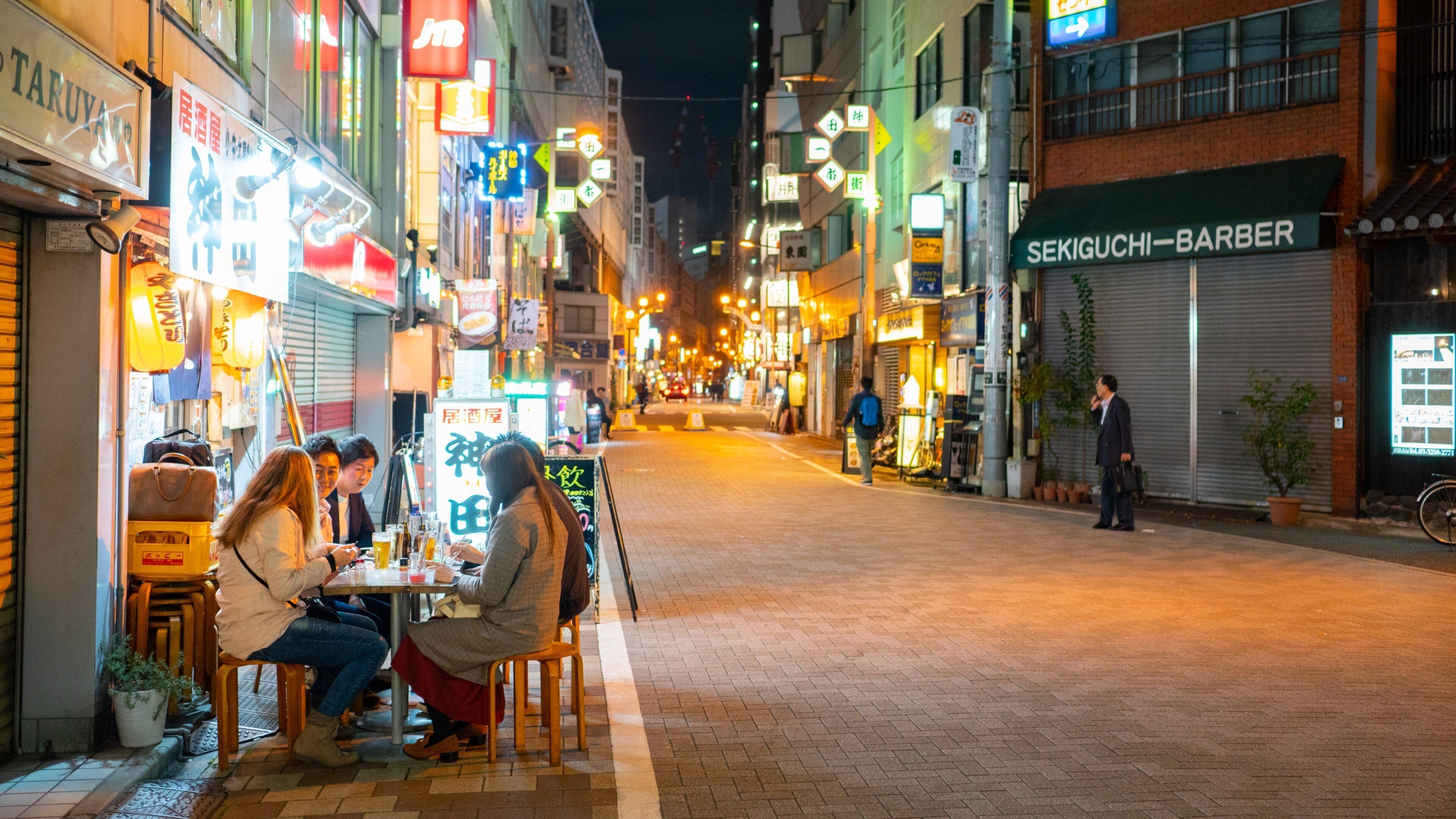Kanda showing night scenes, street scenes and outdoor eating