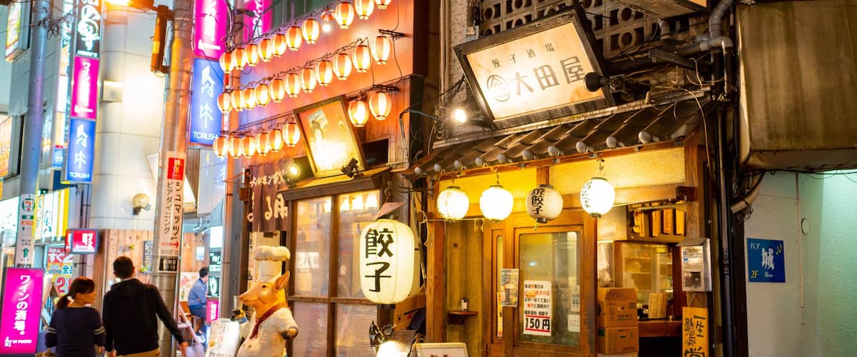 Kanda which includes street scenes, signage and night scenes
