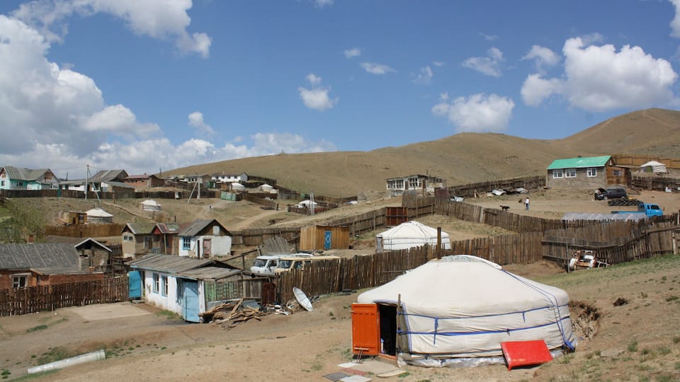 A ger (nomadic tent) community in the barren slope of Chingeltei district, Ulaanbaatar region, Mongolia. Many families live around the solitary slope all year round. It is so cold in winter.