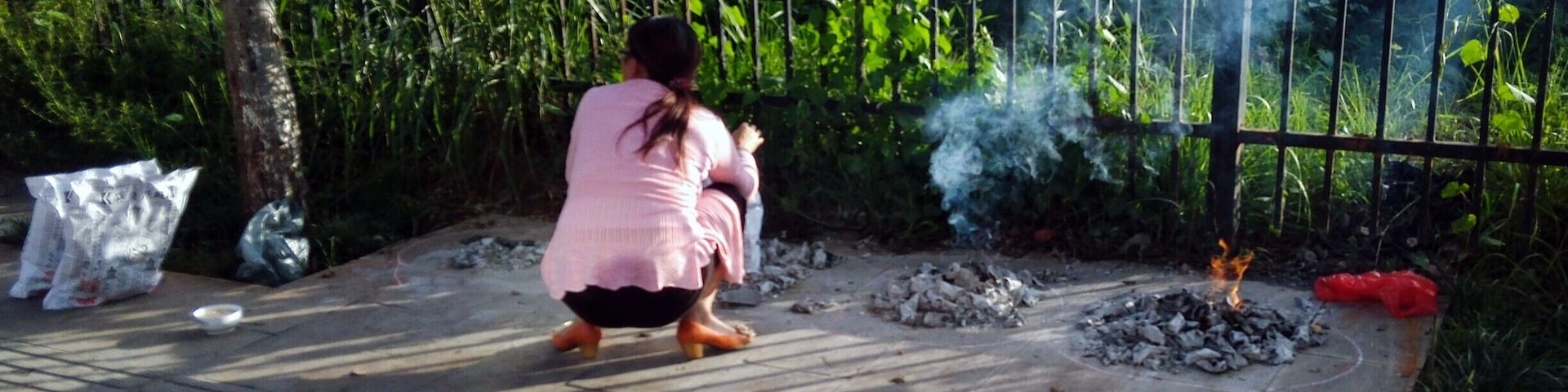 It is the little things in life that matter
Yesterday, I noticed many people burning paper piles along the street.  I know that this kind of paper is called Joss Paper(maybe jinzhi - 金纸) and that it is usually burnt for offering to the dead.
I will ask my students and try to get a better answer later, but in any event, it is a tradition that is displayed without much pomp and circumstances and speaks to Chinese culture.  Do your thing and move on...very cool.