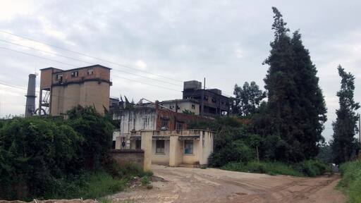 On a Sunday afternoon when the teeming millions in Kunming are fighting for parking spots and a table for lunch, a mere 10 minutes up the mountain, I find a scene straight out of Dickens.
What exactly this place's intended function was is uncertain to me. I am sure it was an important part in Kunming's economic system. It probably took materials from the ground and made shiny strong blocks which built buildings much like itself that is now turning into the same materials it started with. What a sometimes strange world we live in.