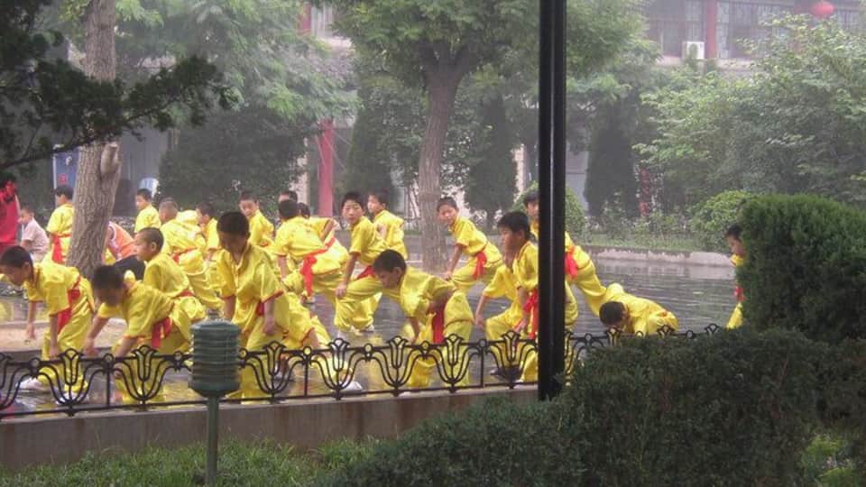 We were walking along and happened upon a kung fu school doing drills outside in the open air.