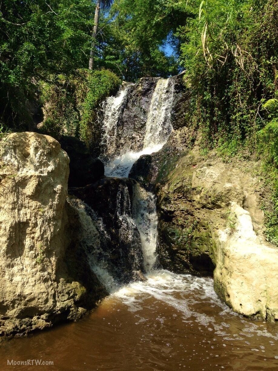 This is the small and unfortunately polluted waterfall upstream. About a 20 minutes walk through some nice sand formations but the water is polluted. If you want to see the FairyStream, do the trip as it is close to Mui Ne. If not I would just venture to the White and Red sand dunes. Be aware that they try and charge you to keep your shoes and/or guide you up the stream. It is not necessary to pay.  Be warned that there are more rocks further upstream. 
Before arriving at the stream there is an interesting smell.  The smell comes from the fermented fish in many clay pots. An interesting sight to see. 