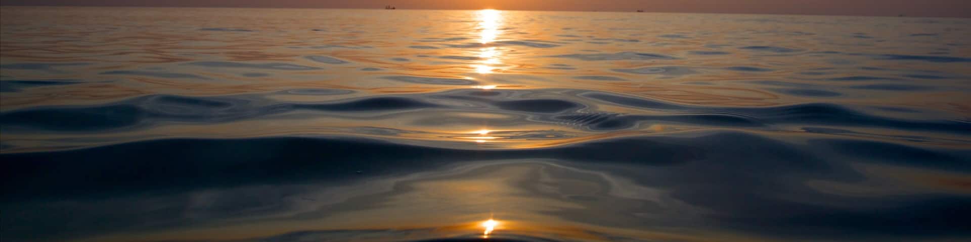 Long Beach featuring general coastal views and a sunset