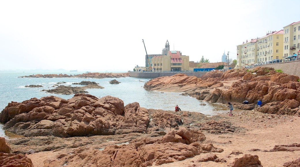 Zhanqiao which includes a coastal town, a beach and general coastal views