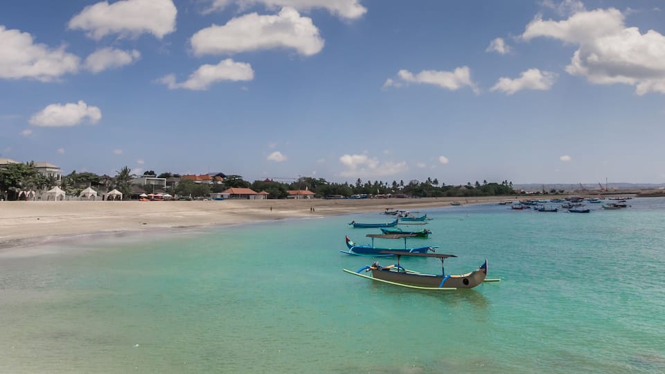 Panorama of the turquoise water in the bay of Kuta. Indonesia