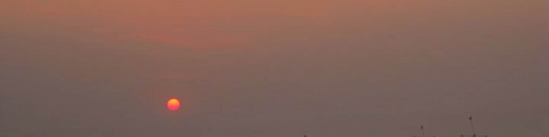 Sunset over the beach down the road from our old home <3