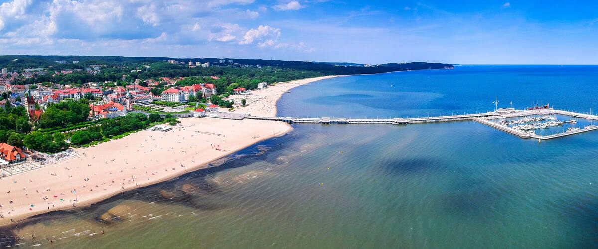 Panorama of the Baltic sea coastline with wooden pier in Sopot, Poland