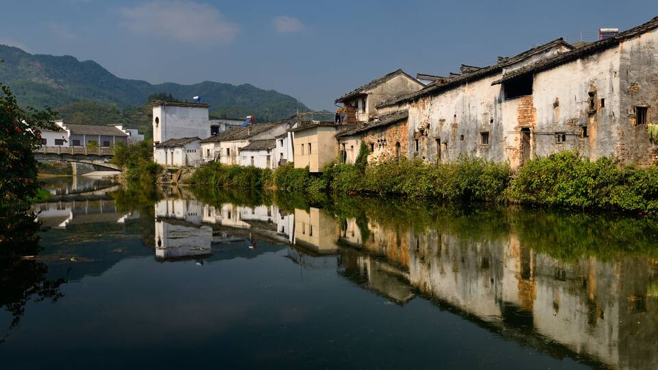 Panorama of Hui style houses on the Longxi river in Chengkan village China