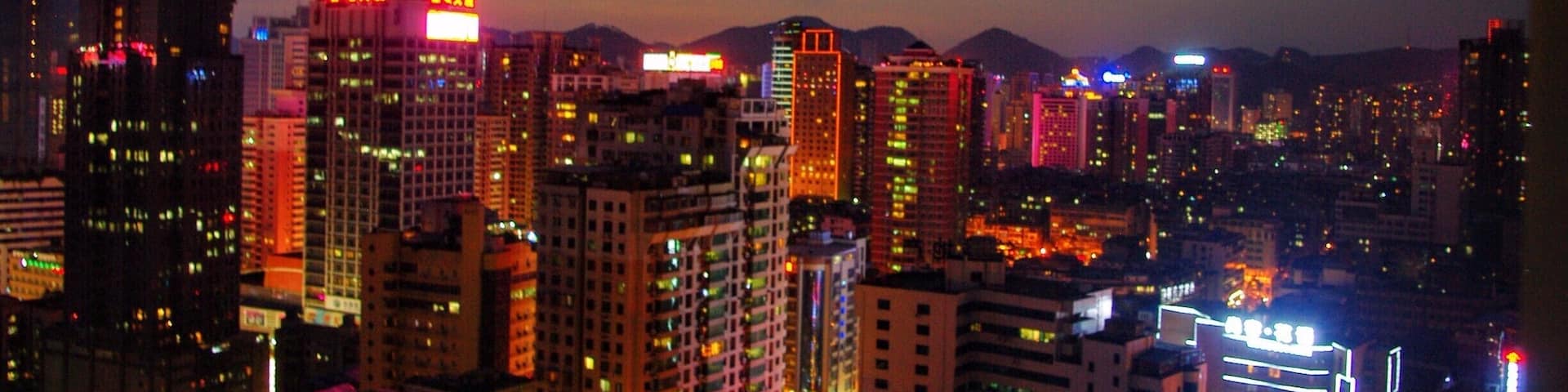 Any skyline at night is a sight to behold, but one of my favorites I've ever seen is this one in Guiyang. I love the contrast of the neon lights of the city with the quintessential conical mountains just visible in the background. Try and stay in a skyscraper to get one of these views and then watch the kite lights dot the sky like stars as it gets progressively darker. #UrbanJungle #Guiyang #China