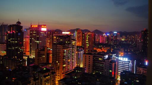Any skyline at night is a sight to behold, but one of my favorites I've ever seen is this one in Guiyang. I love the contrast of the neon lights of the city with the quintessential conical mountains just visible in the background. Try and stay in a skyscraper to get one of these views and then watch the kite lights dot the sky like stars as it gets progressively darker. #UrbanJungle #Guiyang #China