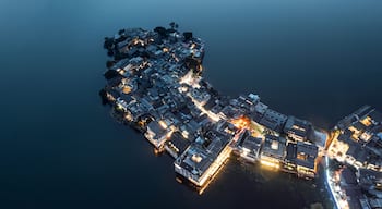 Village and lake in Shuanglang, Yunnan, China.