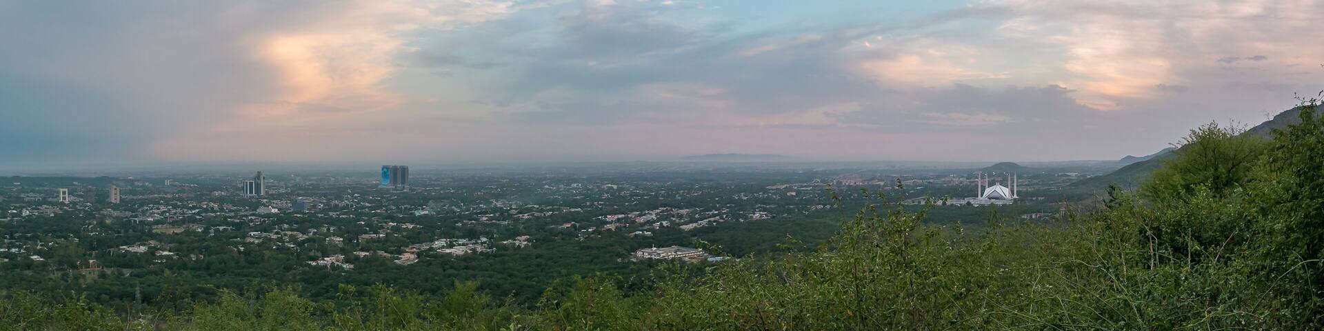 Panoramic aerial view of cloudy sky and Islamabad cityscape from Daman-e-Ko, Pakistan