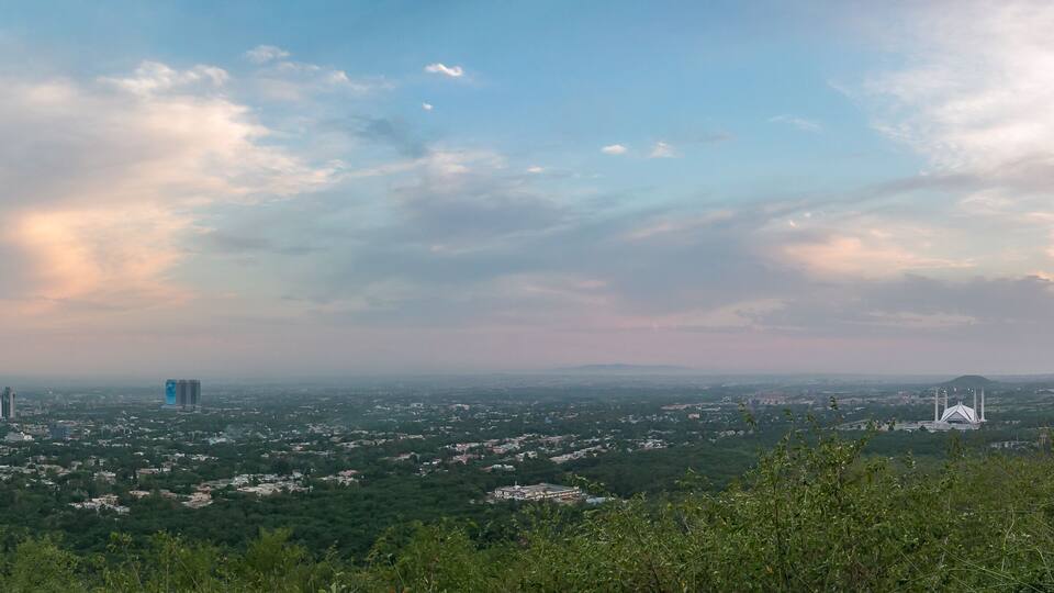 Panoramic aerial view of cloudy sky and Islamabad cityscape from Daman-e-Ko, Pakistan