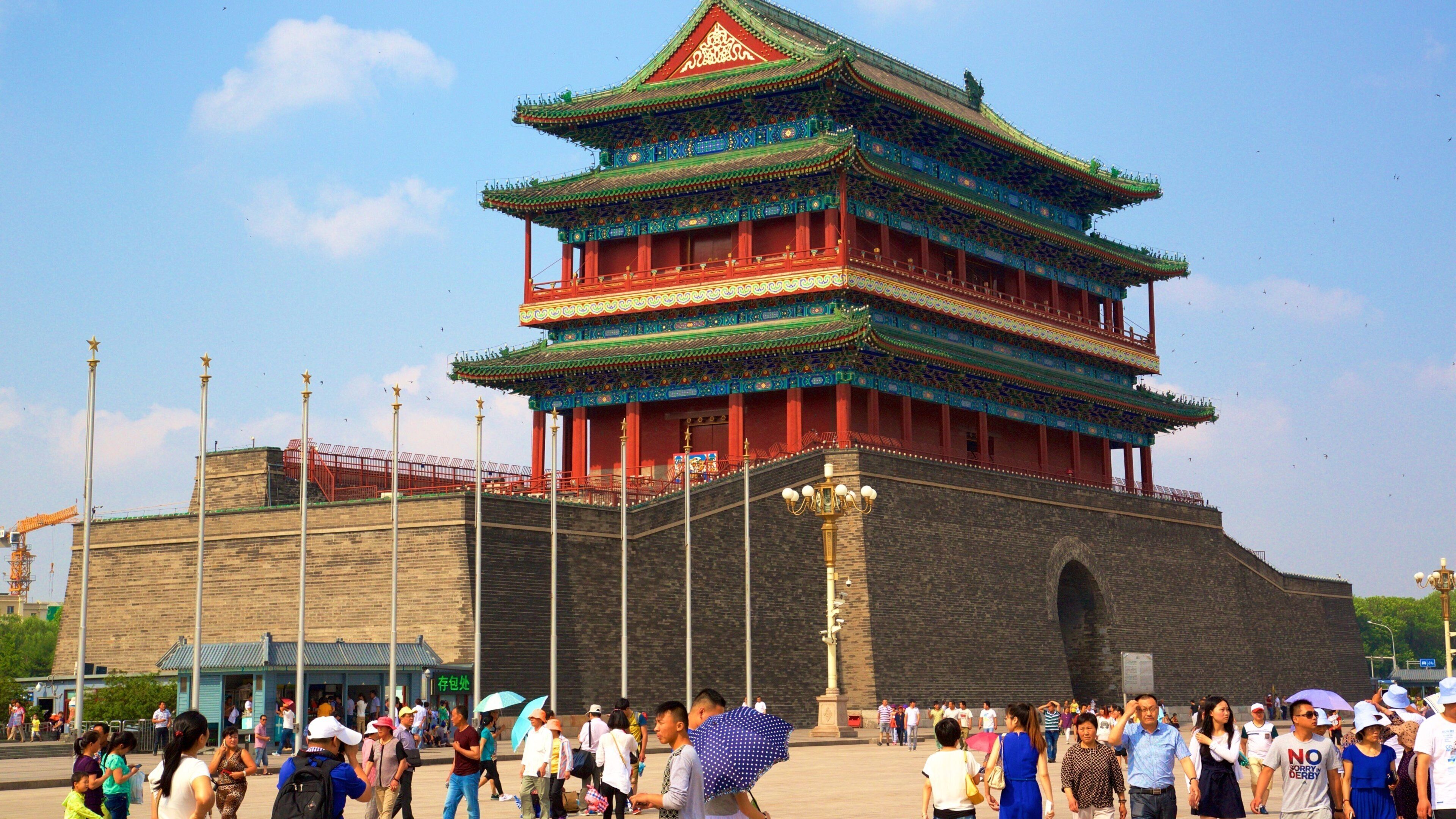 Tiananmen Square which includes heritage elements as well as a large group of people