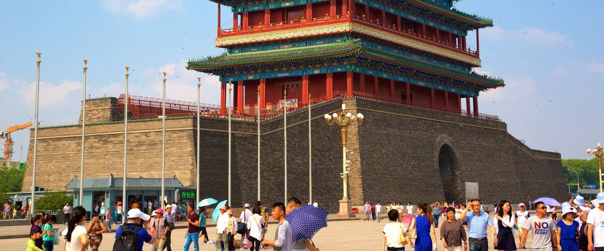 Tiananmen Square which includes heritage elements as well as a large group of people