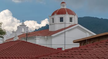 Dome of the main Christian catholic church at the central park of a small tourist town Apaneca located in western mountain region of El Salvador.