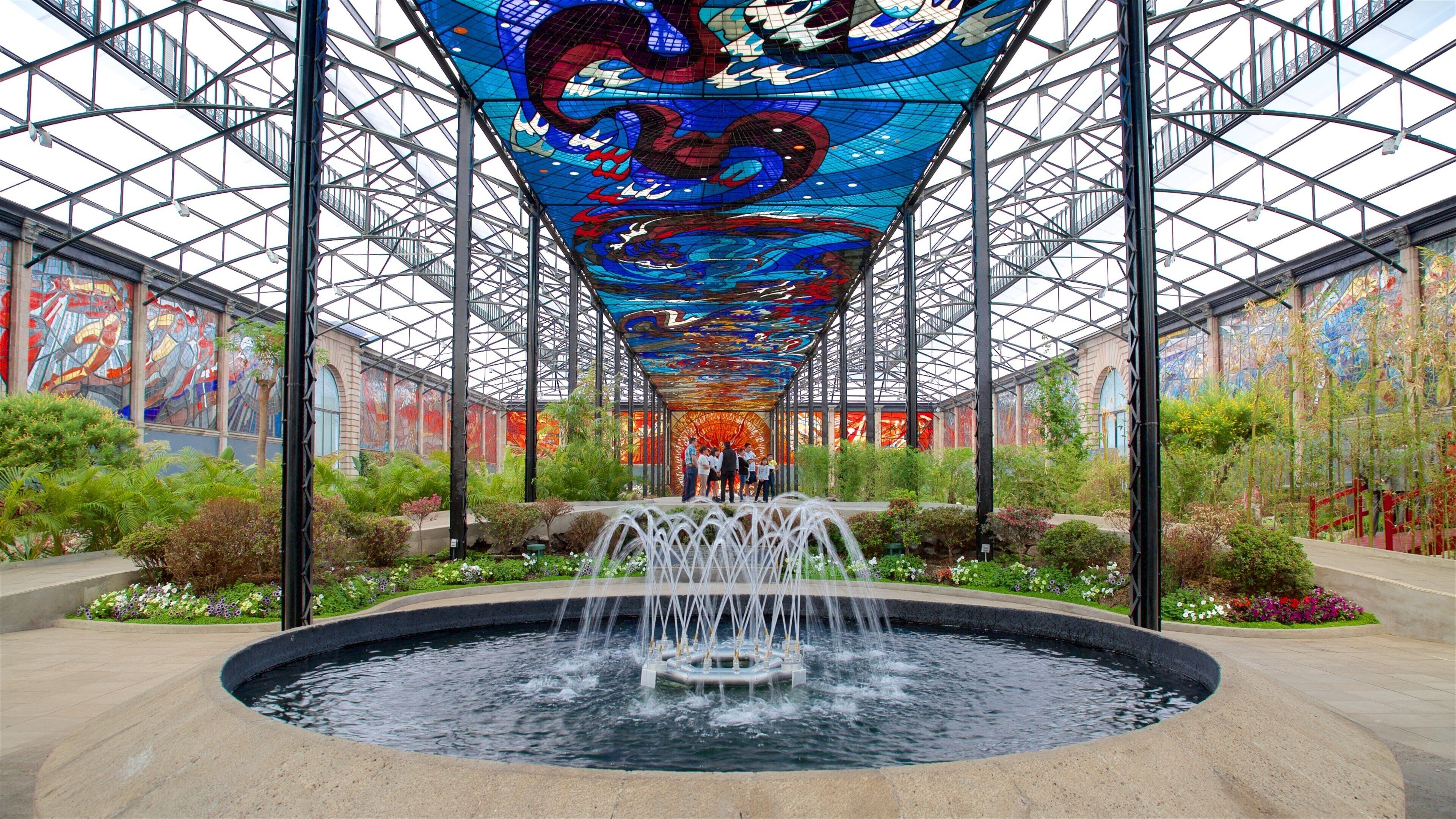 Central Mexico showing a pond, a garden and outdoor art