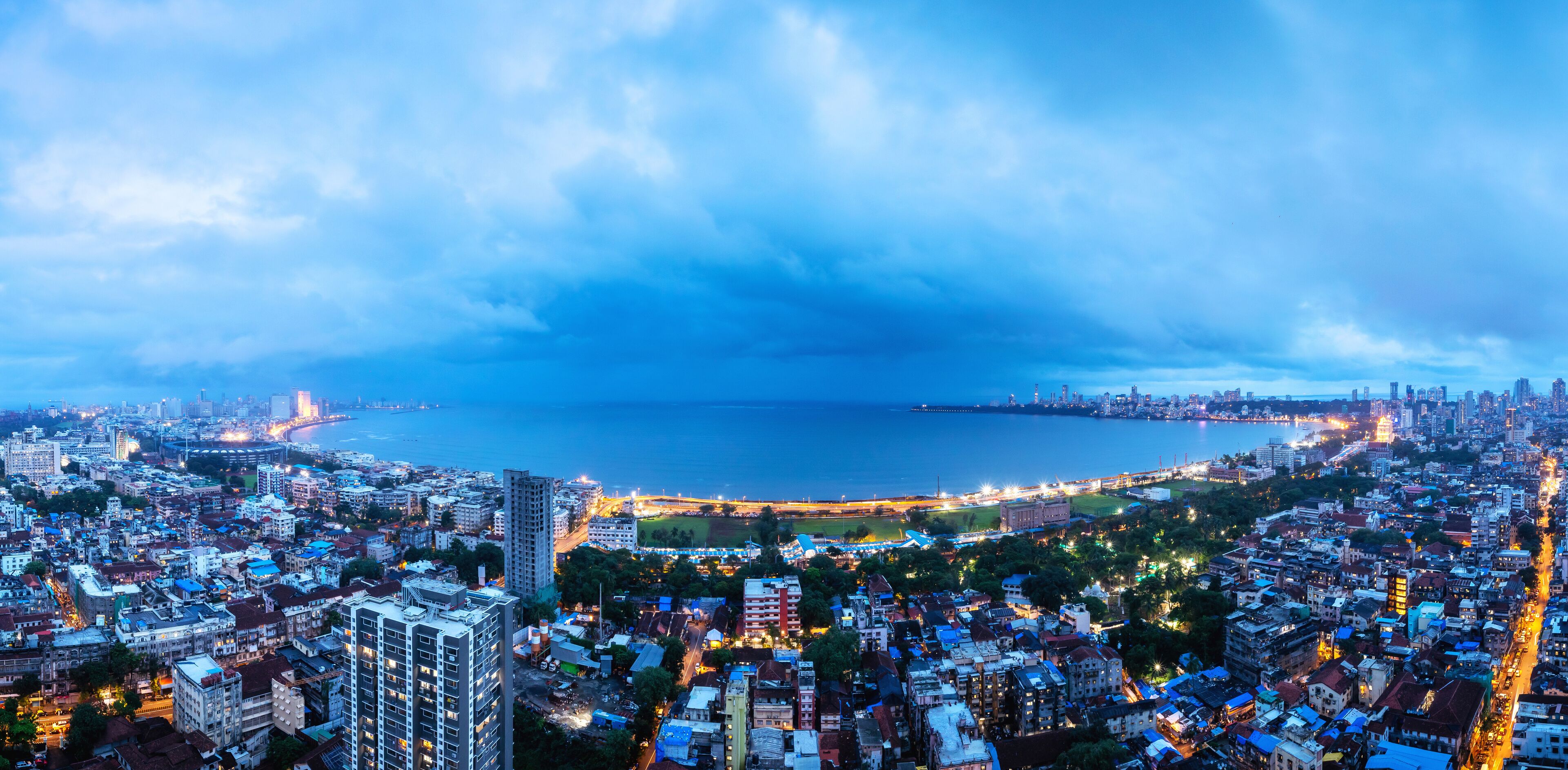The best view of Mumbai's Back Bay and the curve of Marine Drive, as seen from a building in Marine Lines during monsoon.