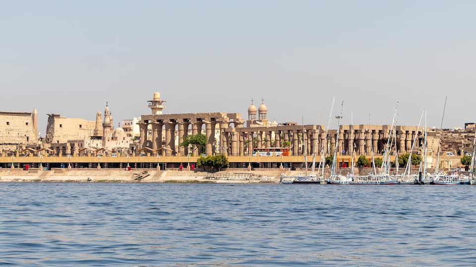 Luxor Temple is a large Ancient Egyptian temple complex on east bank of Nile river in Luxor. View from Nile river