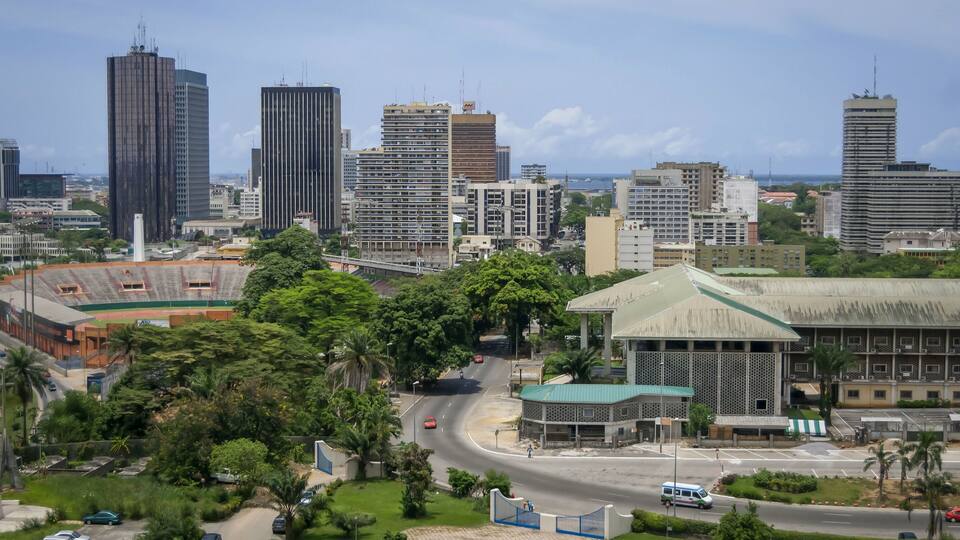 The view of Abidjan, the largest city in Cote d'Ivoire (Ivory Coast). Plateau, the downtown area with the multi-purpose stadium (football, rugby, athletics) nicknamed "le Félicia". Abidjan, April 2013