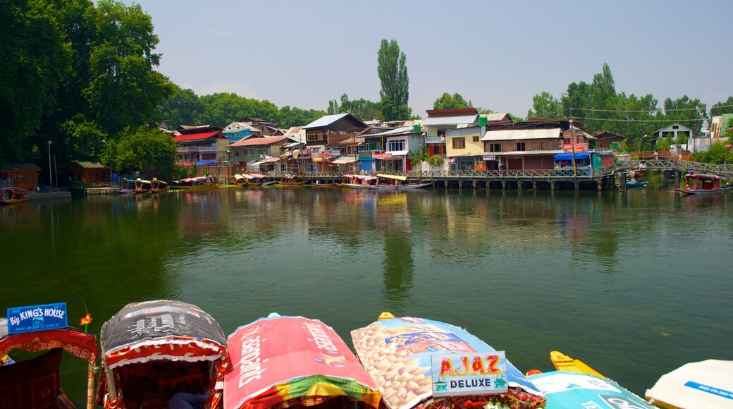 Srinagar showing a lake or waterhole and a house