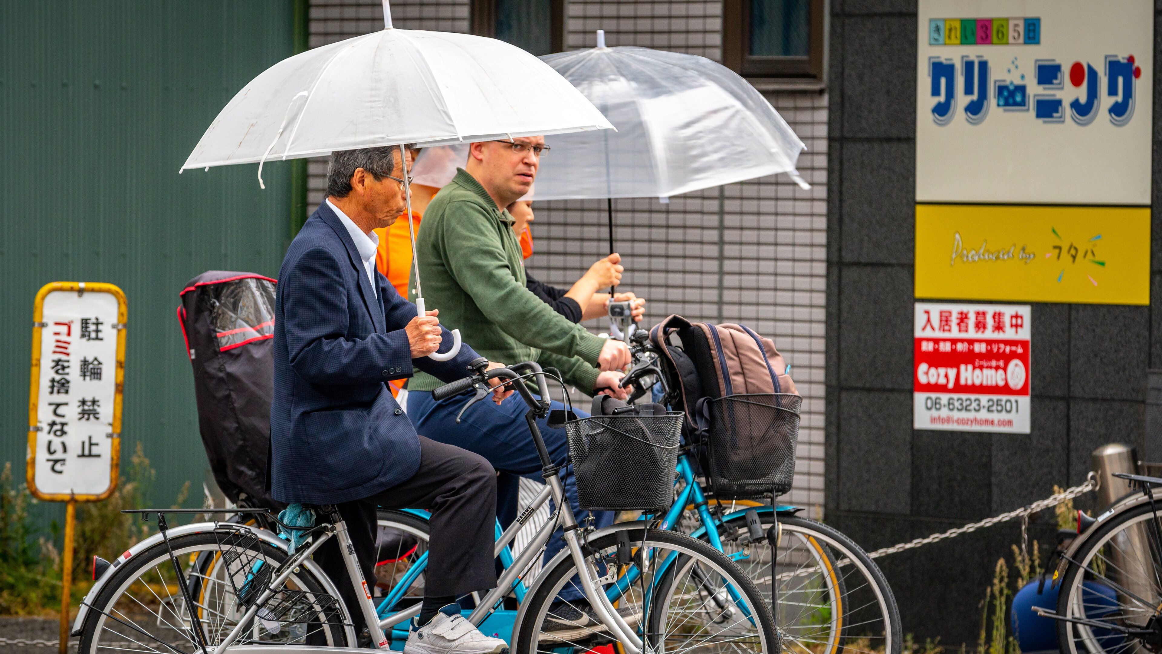 Nakazakicho featuring road cycling and street scenes as well as a small group of people