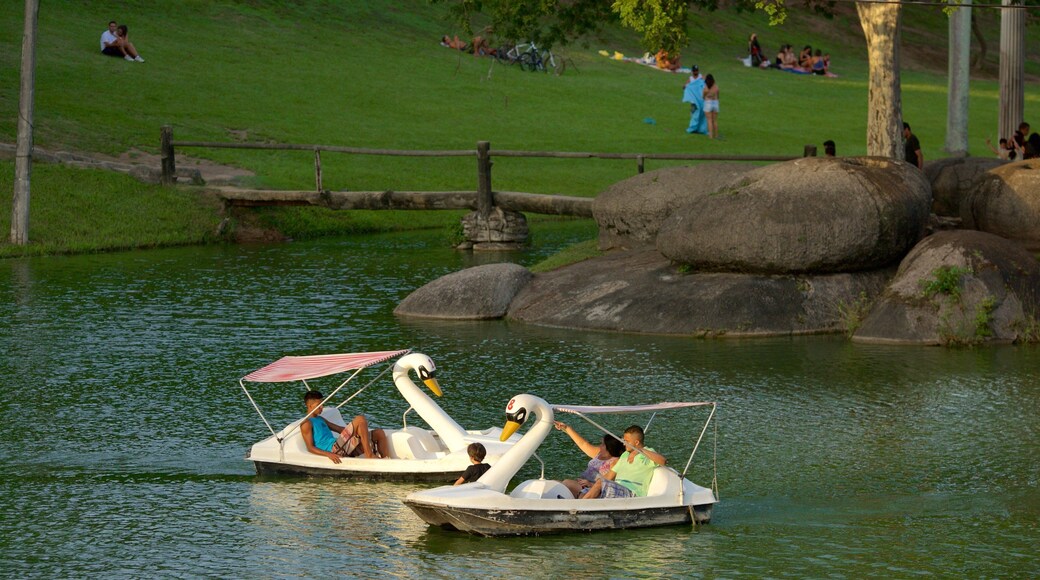 Zona Norte showing boating and a pond as well as a couple