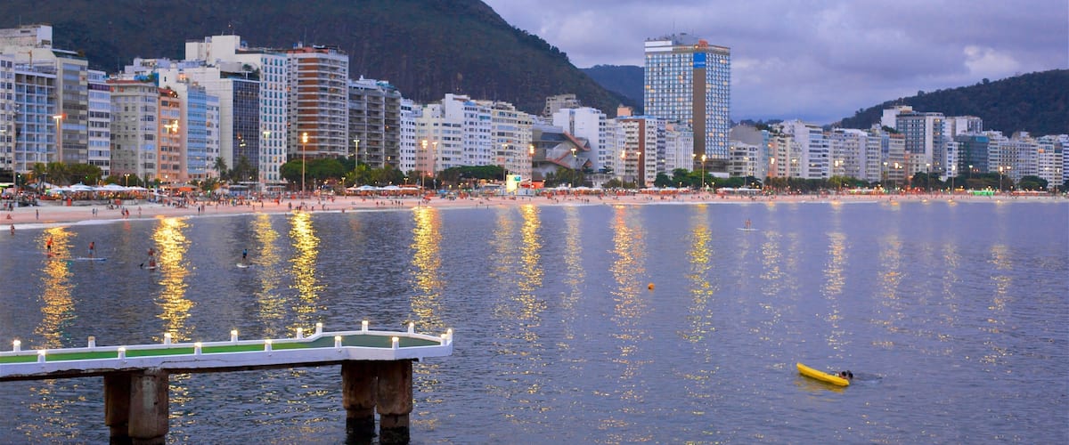 Zona Sul showing general coastal views, kayaking or canoeing and night scenes