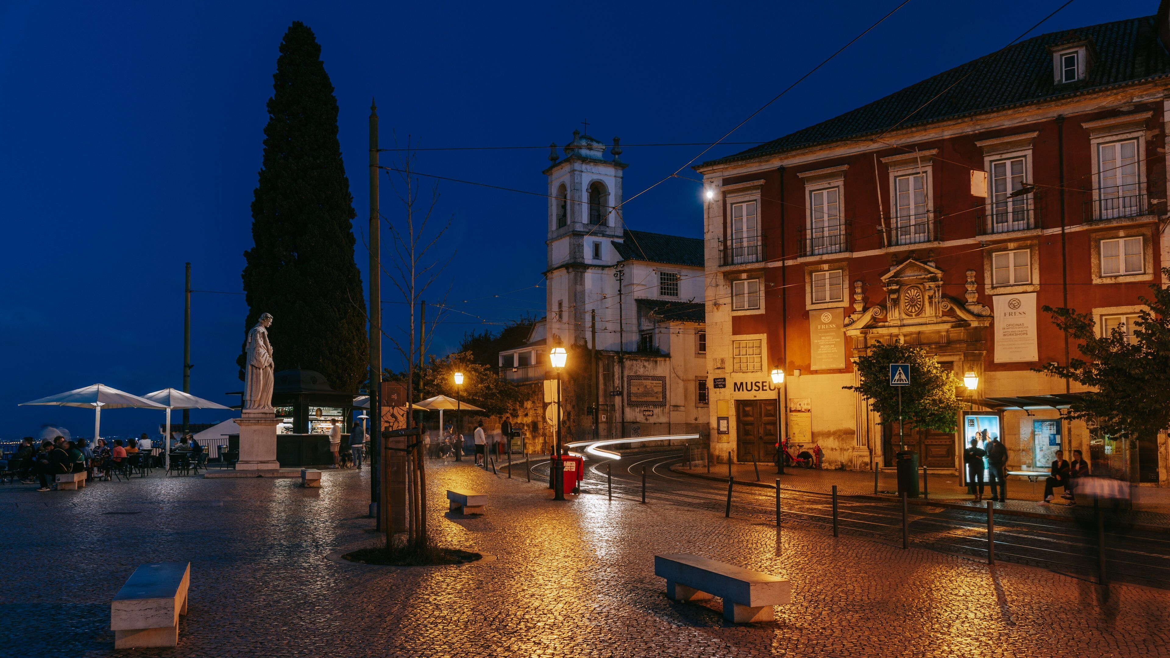 Lisbon Old Town which includes night scenes and a city