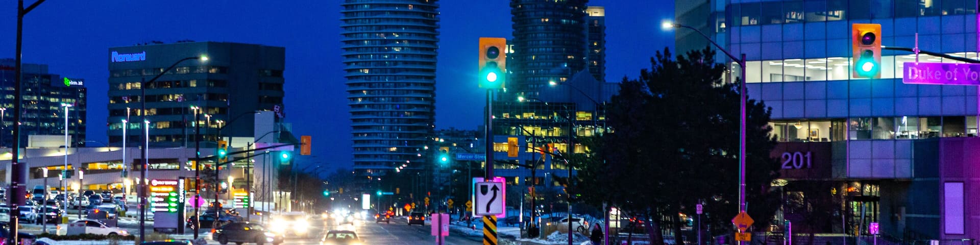 Mississauga, Canada, February 14, 2019: Twin towers of Absolute Condos in, these high-rise Mississauga condos were built in 2007 by Fernbrook Homes. Located in Mississauga's City Centre neighbourhood