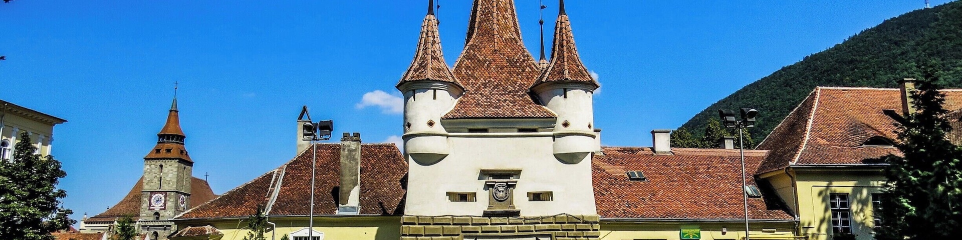 Catherine's Gate in Brasov, Romania. It was built by the Tailors’ Guild in 1559 for defensive purposes instead of an old gate destroyed by the flood in 1526. It is named after St. Catherine's Monastery that was situated there in former times. It is the only original city gate to have survived from medieval times. In fact the central tower is only a part of the original gate. Documents talk about the existence of a wooden structure which was demolished in 1827. The original structure can be seen at the Weaver's Bastion where the large model of Brasov in 1600 is displayed.