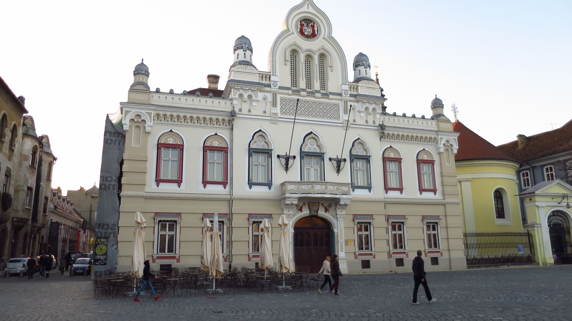 The Serbian Orthodox Cathedral
The building is executed in the Baroque style with Classicist elements, due perhaps to some restorations from the beginning of the nineteenth century.
The patron of the church is the Ascension of Virgin Mary. This church replaces an older church that was dedicated to St. George – just like the opposite Roman Catholic Cathedral. The old church was not exactly on the same place as the one built in 1744; it appears that it was set up in the former Seidi Ahmed Mosque, located on the current Gh. Lazar Street, midway between the intersections with streets Ungureanu and Mărăşeşti. It was destroyed by fire in 1737.

The cathedral is a historical and religious monument of prime importance, both to Timişoara and for Romania and Serbia.