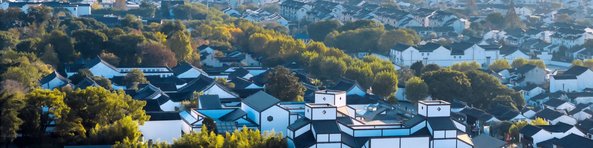 Aerial view of Suzhou Museum and Pingjiang Road in the old city of Suzhou, Jiangsu Province, China.